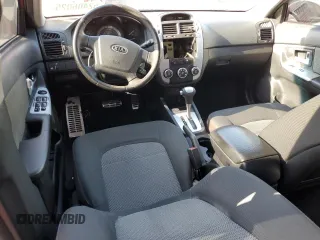 2009 Kia Spectra EX with VIN KNAFE222995027376, listed as a Copart auction lot 52406025 with 73,692 mi miles and Salvage Title. Bid and sale history available at DreamBid. Image 8.