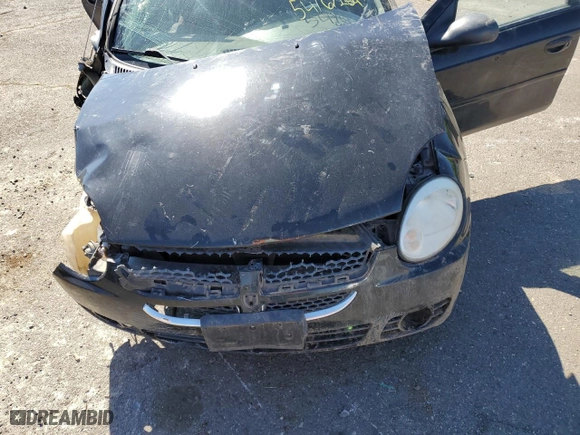2004 Dodge Neon SXT with VIN 1B3ES56CX4D585569, listed as a Copart auction lot 54167284 with 0 mi miles and Salvage Title. Bid and sale history available at carsss.com. Image 12.