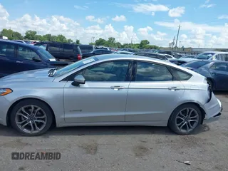 2017 Ford Fusion Hybrid SE with VIN 3FA6P0LU4HR234101, listed as a IAAI auction lot 42579447 with 169,273 mi miles and . Bid and sale history available at DreamBid. Image 14.