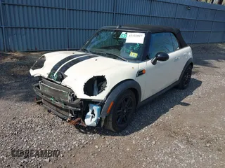 2013 MINI Convertible with VIN WMWZN3C58DT135598, listed as a IAAI auction lot 42122817 with 120,638 mi miles and . Bid and sale history available at DreamBid. Image 2.