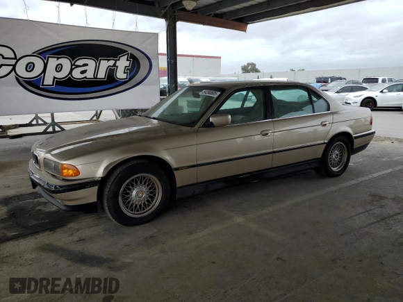 1998 BMW 7 Series 740il with VIN WBAGJ832XWDM11394, listed as a Copart auction lot 54390685 with 126,828 mi miles and Clean Title. Bid and sale history available at carsss.com. Image 1.