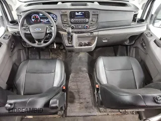2023 Ford Transit Cargo z VIN 1FTBR1X8XPKB01724, wystawiony jako Copart lot #43828525 z przebiegiem 39 657 mil mil oraz Czysty tytuł • Clean title. Historia ofert i sprzedaży dostępna na DreamBid. Obrazek 8.