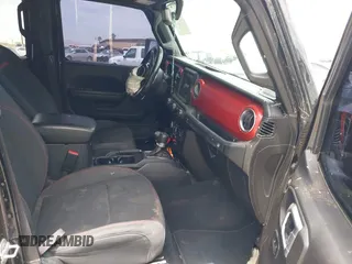 2022 Jeep Wrangler Unlimited Rubicon with VIN 1C4HJXFN2NW134024, listed as a IAAI auction lot 42248188 with 41,899 mi miles and . Bid and sale history available at DreamBid. Image 5.
