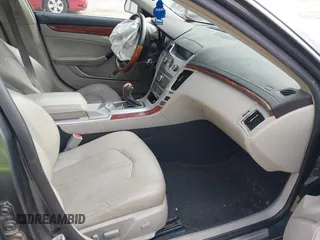 2012 Cadillac CTS Luxury z VIN 1G6DE5E51C0112608, wystawiony jako IAAI lot #41656992 z przebiegiem Nie podano mil oraz . Historia ofert i sprzedaży dostępna na DreamBid. Obrazek 5.