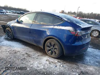 2024 Tesla Model Y Long Range with VIN 7SAYGDEE2RF129577, listed as a IAAI auction lot 41357180 with 6,697 mi miles and . Bid and sale history available at DreamBid. Image 3.