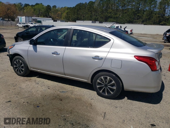 2016 Nissan Versa SV with VIN 3N1CN7AP8GL830552, listed as a Copart auction lot 52858135 with 127,875 mi miles and Salvage Title. Bid and sale history available at DreamBid. Image 2.