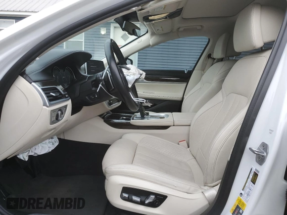 2018 BMW 7 Series 740e xDrive with VIN WBA7J2C57JG938114, listed as a Copart auction lot 41833424 with 45,559 mi miles and . Bid and sale history available at DreamBid. Image 7.