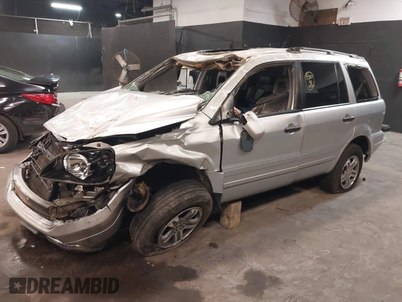 2005 Honda Pilot EX-L with VIN 5FNYF18635B056717, listed as a IAAI auction lot 42197100 with 80,400 mi miles and . Bid and sale history available at DreamBid. Image 2.