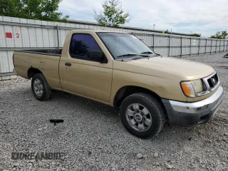 1999 Nissan Frontier XE with VIN 1N6DD21S9XC312809, listed as a Copart auction lot 57702005 with 174,183 mi miles and Clean title. Bid and sale history available at DreamBid. Image 4.