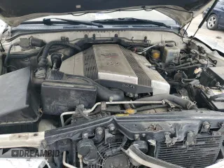 2000 Toyota Land Cruiser with VIN JT3HT05J9Y0101498, listed as a Copart auction lot 76126734 with 173,138 mi miles and Salvage Title. Bid and sale history available at carsss.com. Image 13.