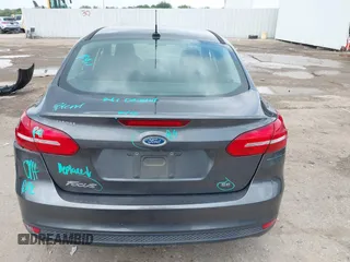 2017 Ford Focus SE with VIN 1FADP3F23HL232809, listed as a IAAI auction lot 42117700 with 104,802 mi miles and . Bid and sale history available at DreamBid. Image 16.
