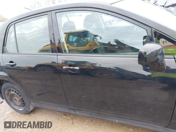 2011 Nissan Versa 1.8 S with VIN 3N1BC1AP7BL378133, listed as a IAAI auction lot 41917425 with 124,228 mi miles. Bid and sale history available at carsss.com. Image 13.