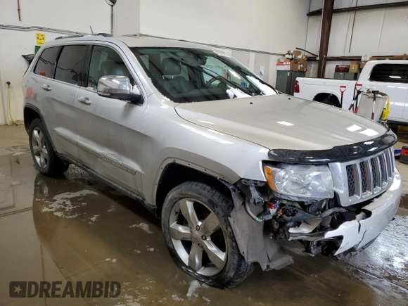 2013 Jeep Grand Cherokee Overland with VIN 1C4RJFCG2DC622345, listed as a Copart auction lot 49640325 with 192,144 mi miles and Salvage Title. Bid and sale history available at carsss.com. Image 4.
