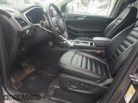 2021 Ford Edge SEL z VIN 2FMPK3J98MBA50555, wystawiony jako Copart lot #58509445 z przebiegiem 114 188 mil mil oraz Czysty tytuł • Clean title. Historia ofert i sprzedaży dostępna na DreamBid. Obrazek 7.