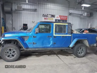 2021 Jeep Gladiator Willys with VIN 1C6HJTAG9ML535479, listed as a IAAI auction lot 41212241 with 81,044 mi miles and . Bid and sale history available at DreamBid. Image 15.