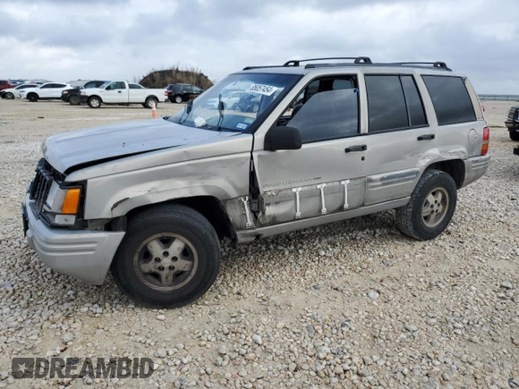 1998 Jeep Grand Cherokee with VIN 1J4FX48S6WC345358, listed as a Copart auction lot 85057454 with Not provided miles and Salvage title. Bid and sale history available at DreamBid. Image 1.