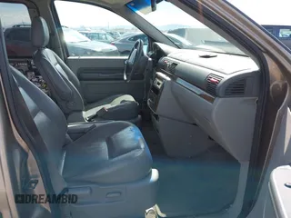 2004 Ford Freestar Limited z VIN 2FMDA58244BB22717, wystawiony jako IAAI lot #42084740 z przebiegiem Nie podano mil oraz . Historia ofert i sprzedaży dostępna na DreamBid. Obrazek 5.