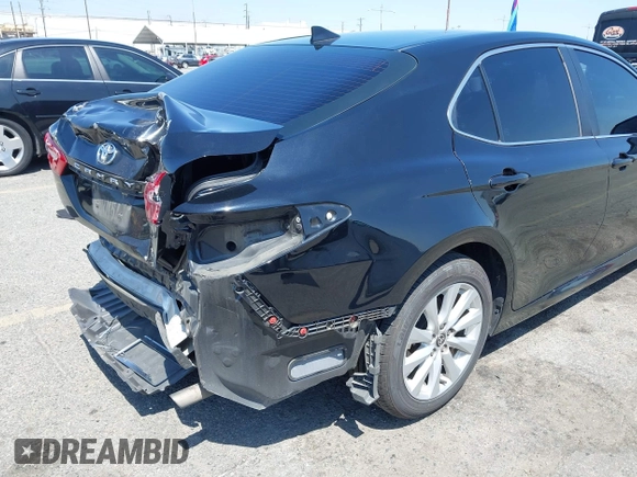 2020 Toyota Camry LE with VIN 4T1C11AKXLU955851, listed as a IAAI auction lot 41996827 with 59,008 mi miles and . Bid and sale history available at carsss.com. Image 21.