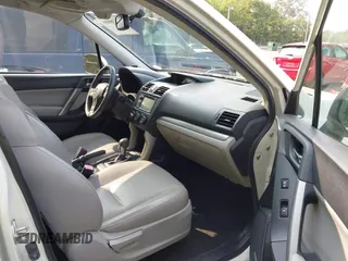 2015 Subaru Forester Touring with VIN JF2SJAWC9FH573973, listed as a IAAI auction lot 42380080 with 87,938 mi miles and . Bid and sale history available at DreamBid. Image 5.