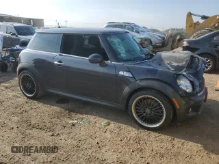 2009 MINI Hardtop S with VIN WMWMF73599TT94509, listed as a Copart auction lot 53495645 with Not provided miles and Salvage title. Bid and sale history available at DreamBid. Image 4.