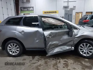 2011 Mazda CX-7 i Sport z VIN JM3ER2B53B0391249, wystawiony jako IAAI lot #41935241 z przebiegiem 190 163 mil mil oraz . Historia ofert i sprzedaży dostępna na DreamBid. Obrazek 14.