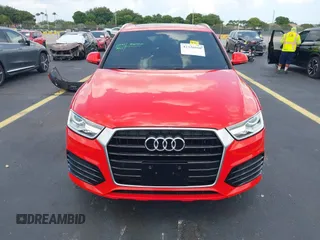 2018 Audi Q3 Premium z VIN WA1BCCFS1JR005466, wystawiony jako IAAI lot #42326910 z przebiegiem 78 497 mil mil oraz . Historia ofert i sprzedaży dostępna na DreamBid. Obrazek 12.