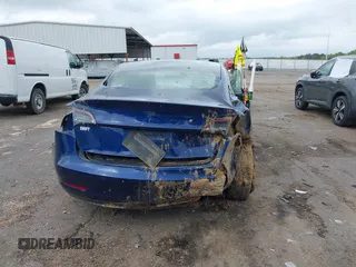 2019 Tesla Model 3 Mid Range z VIN 5YJ3E1EAXKF332974, wystawiony jako IAAI lot #41921722 z przebiegiem Nie podano mil oraz . Historia ofert i sprzedaży dostępna na DreamBid. Obrazek 16.