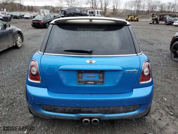 2010 MINI Cooper Hardtop S with VIN WMWMF7C52ATX41568, listed as a Copart auction lot 52250215 with 112,039 mi miles and Clean Title. Bid and sale history available at carsss.com. Image 6.