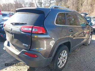 2016 Jeep Cherokee Latitude with VIN 1C4PJMCB1GW368212, listed as a IAAI auction lot 41017403 with 83,572 mi miles and . Bid and sale history available at carsss.com. Image 4.