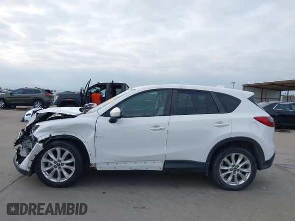2013 Mazda CX-5 Grand Touring with VIN JM3KE2DEXD0166115, listed as a IAAI auction lot 41919164 with 102,999 mi miles and . Bid and sale history available at carsss.com. Image 15.