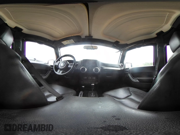 2015 Jeep Wrangler Unlimited Rubicon with VIN 1C4BJWFG7FL688728, listed as a IAAI auction lot 42054304 with 100,152 mi miles and . Bid and sale history available at DreamBid. Image 18.