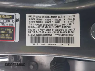 2010 Honda Insight LX with VIN JHMZE2H50AS019740, listed as a IAAI auction lot 41665527 with 74,022 mi miles and . Bid and sale history available at DreamBid. Image 9.