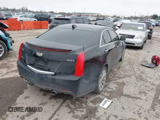 2018 Cadillac ATS RWD z VIN 1G6AA5RX7J0183805, wystawiony jako IAAI lot #41398076 z przebiegiem 103 784 mil mil oraz . Historia ofert i sprzedaży dostępna na DreamBid. Obrazek 4.