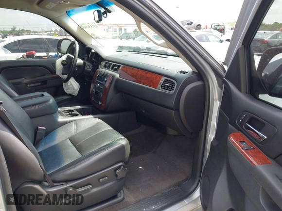 2013 Chevrolet Suburban LT with VIN 1GNSCJE08DR378459, listed as a IAAI auction lot 42453650 with 179,156 mi miles and . Bid and sale history available at DreamBid. Image 5.