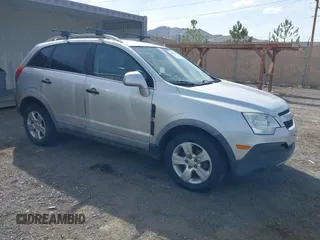 2013 Chevrolet Captiva Sport LS with VIN 3GNAL2EKXDS632673, listed as a IAAI auction lot 42129294 with 123,876 mi miles. Bid and sale history available at carsss.com. Image 1.