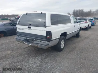 1996 Dodge Ram 1500 with VIN 1B7HC16Y7TS692599, listed as a IAAI auction lot 41897126 with 113,562 mi miles. Bid and sale history available at carsss.com. Image 4.