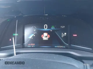 2022 Toyota Mirai XLE with VIN JTDAAAAA9NA007013, listed as a IAAI auction lot 41744965 with 23,243 mi miles and . Bid and sale history available at DreamBid. Image 7.