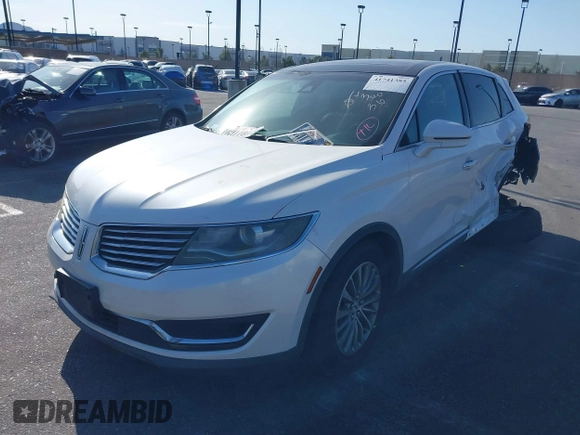 2016 Lincoln MKX Select with VIN 2LMTJ6KR5GBL30010, listed as a IAAI auction lot 41741385 with 112,647 mi miles. Bid and sale history available at carsss.com. Image 2.