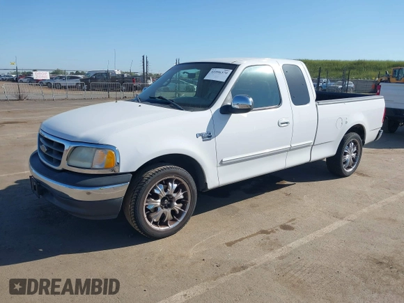 2000 Ford F-150 XL with VIN 1FTRX17LXYKA19714, listed as a IAAI auction lot 41996370 with 0 mi miles. Bid and sale history available at carsss.com. Image 2.