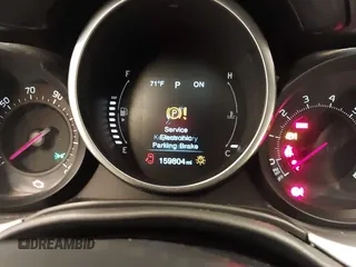 2016 FIAT 500X Lounge z VIN ZFBCFYDT0GP332060, wystawiony jako IAAI lot #42837184 z przebiegiem 159 804 mil mil oraz . Historia ofert i sprzedaży dostępna na DreamBid. Obrazek 7.