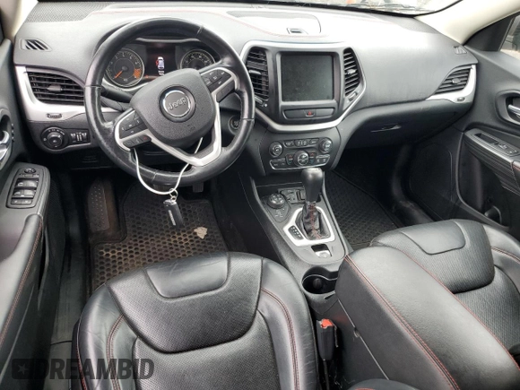 2015 Jeep Cherokee Trailhawk with VIN 1C4PJMBS6FW680963, listed as a Copart auction lot 61306385 with 174,793 mi miles and Clean title. Bid and sale history available at DreamBid. Image 8.