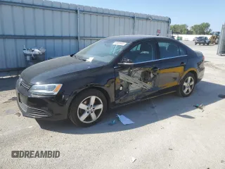 2014 Volkswagen Jetta TDI w/Premium with VIN 3VW3L7AJ2EM392016, listed as a Copart auction lot 69305904 with 111,903 mi miles and Salvage title. Bid and sale history available at DreamBid. Image 1.