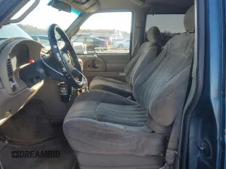 1999 GMC Safari with VIN 1GKEL19W0XB509860, listed as a Copart auction lot 84671294 with 141,872 mi miles and Salvage Title. Bid and sale history available at carsss.com. Image 7.