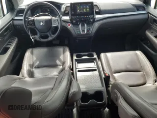 2018 Honda Odyssey EX-L z VIN 5FNRL6H7XJB031245, wystawiony jako Copart lot #59331635 z przebiegiem 74 901 mil mil oraz Czysty tytuł • Clean title. Historia ofert i sprzedaży dostępna na DreamBid. Obrazek 8.