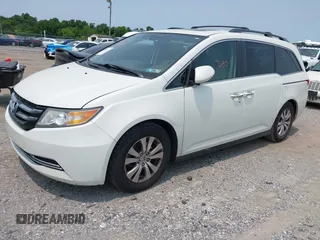 2014 Honda Odyssey EX-L with VIN 5FNRL5H62EB109573, listed as a IAAI auction lot 42387637 with 208,061 mi miles and . Bid and sale history available at DreamBid. Image 2.