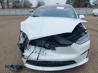 2022 Tesla Model X Plaid with VIN 7SAXCBE68NF333394, listed as a IAAI auction lot 41615086 with Not Provided miles and . Bid and sale history available at carsss.com. Image 11.