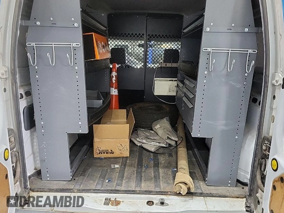 2013 Ford Transit Connect XLT with VIN NM0LS7DN0DT173217, listed as a IAAI auction lot 41975819 with 106,068 mi miles and . Bid and sale history available at DreamBid. Image 1.