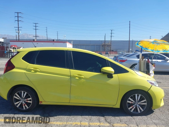 2016 Honda Fit EX z VIN JHMGK5H7XGS003430, wystawiony jako IAAI lot #42676495 z przebiegiem 167 100 mil mil oraz . Historia ofert i sprzedaży dostępna na DreamBid. Obrazek 14.
