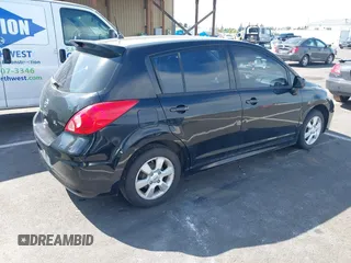 2009 Nissan Versa 1.8 SL with VIN 3N1BC13E99L409145, listed as a IAAI auction lot 42151530 with 150,930 mi miles. Bid and sale history available at carsss.com. Image 4.