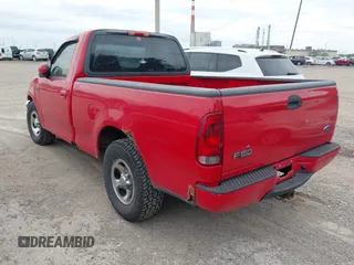 2003 Ford F-150 XL z VIN 1FTRF17203NA83617, wystawiony jako IAAI lot #42360791 z przebiegiem 285 094 mil mil oraz . Historia ofert i sprzedaży dostępna na DreamBid. Obrazek 3.